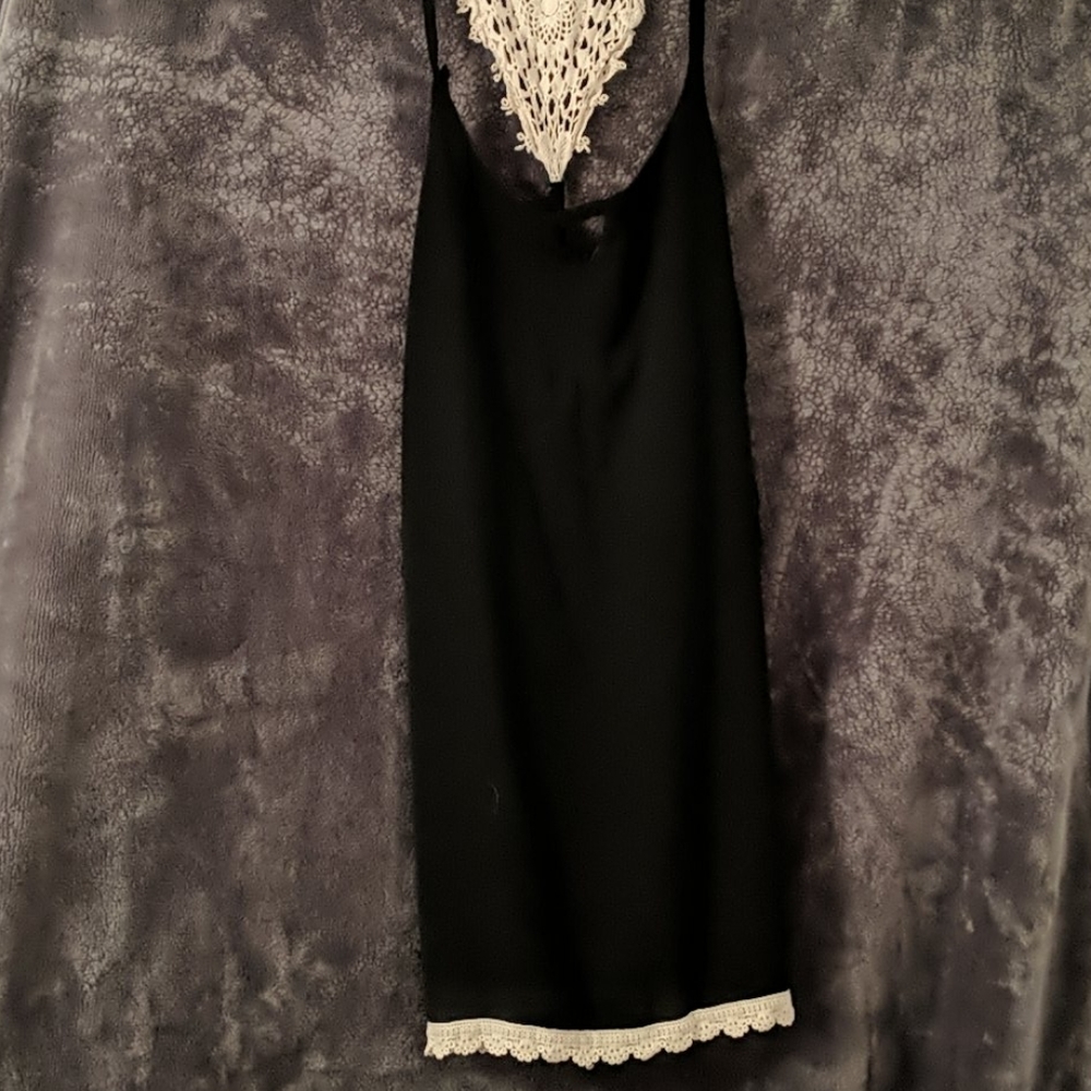 Black babydoll dress with white lace
